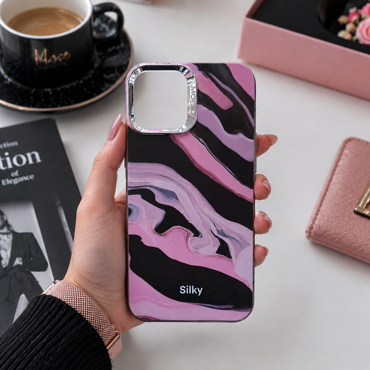 قاب آیفون 12 پرو مکس مدل Silky با طرح ماربل صورتی و مشکی و فریم نقرهای دور دوربین